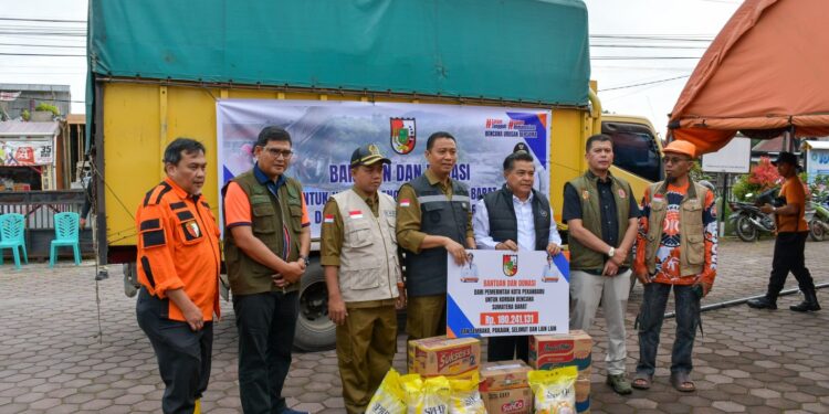 Pekanbaru Salurkan Bantuan untuk Korban Bencana Agam: Lima Truk Logistik dan Rp180 Juta